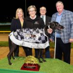 Wow She's Fast on the winner's dais.