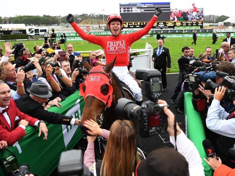 Jockey Kerrin McEvoy reacts after Redzel won the Everest