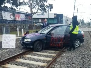 Woman charged over Melbourne Cup protest