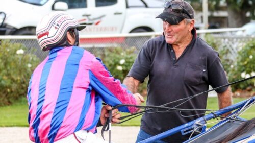 Mark-congrats-shakes-hand-for-obit-blog_